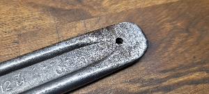 The rare factory made tire end of the handle. Someone has drilled a hole afterwards, when new, there wasn't any holes in the handles.